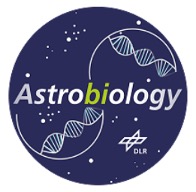 Term "Astrobiology" on a blue circular background. It is decorated with white stars, two DNA strands and shows the logo of DL